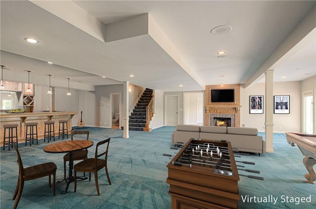 game room featuring carpet, a fireplace, baseboards, and recessed lighting