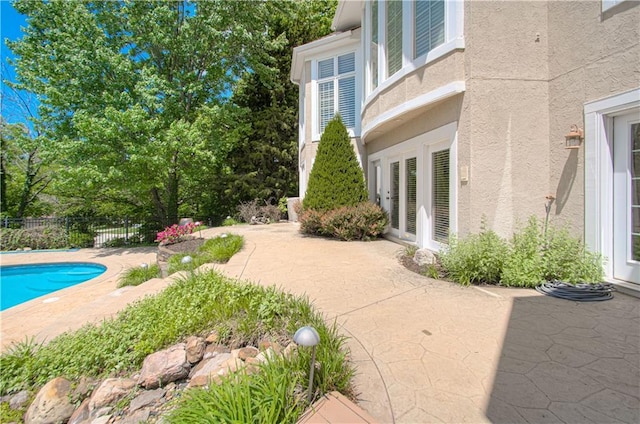 view of patio with fence