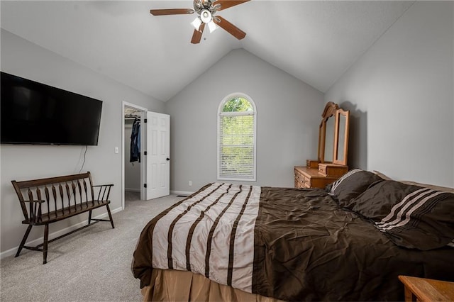 bedroom featuring baseboards, a ceiling fan, vaulted ceiling, and light colored carpet