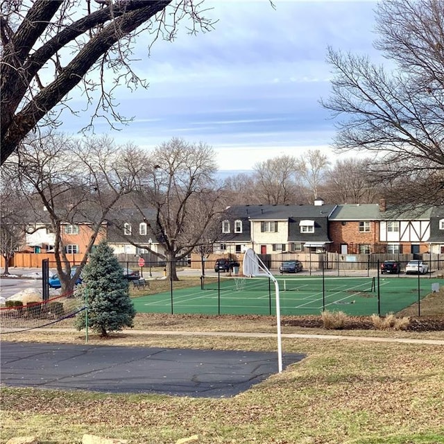 surrounding community featuring fence and a residential view