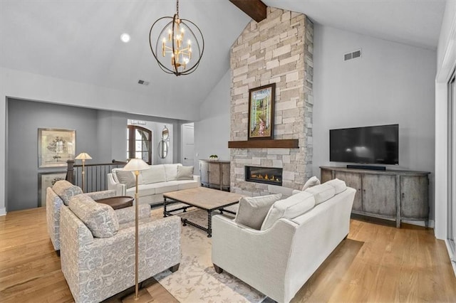 2189 W 89th Pl, Leawood, KS 66206 - living room featuring a notable chandelier, light wood-style flooring, visible vents, beamed ceiling, and high vaulted ceiling