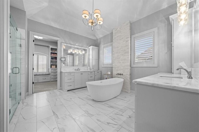 2189 W 89th Pl, Leawood, KS 66206 - bathroom with a sink, marble finish floor, a chandelier, and a stall shower