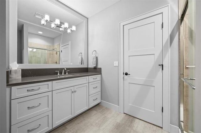 2189 W 89th Pl, Leawood, KS 66206 - full bathroom featuring vanity, baseboards, and a stall shower
