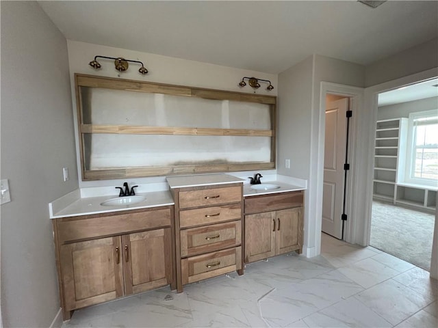 16941 S Brentwood St, Olathe, KS 66062 - bathroom featuring marble finish floor, double vanity, and a sink