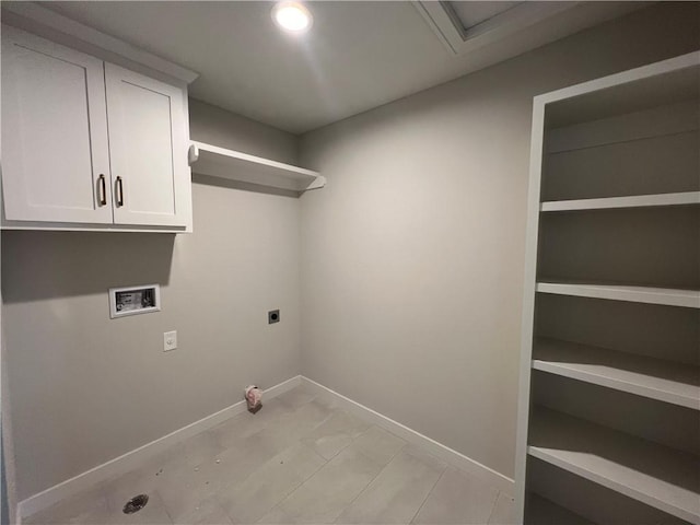 16941 S Brentwood St, Olathe, KS 66062 - clothes washing area with hookup for an electric dryer, recessed lighting, hookup for a washing machine, baseboards, and cabinet space