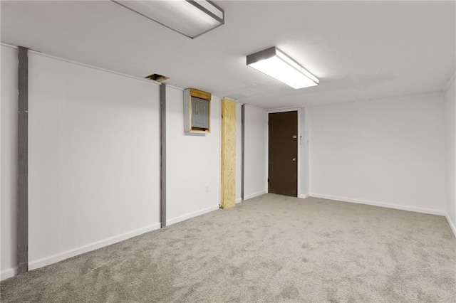 601 Westside Dr, Knob Noster, MO 65336 - finished below grade area with carpet floors and electric panel