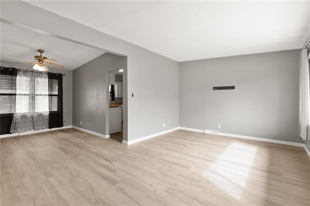 601 Westside Dr, Knob Noster, MO 65336 - empty room featuring light wood-style floors, ceiling fan, and healthy amount of natural light