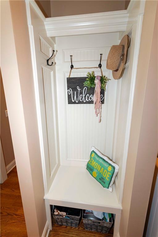 mudroom with wood finished floors