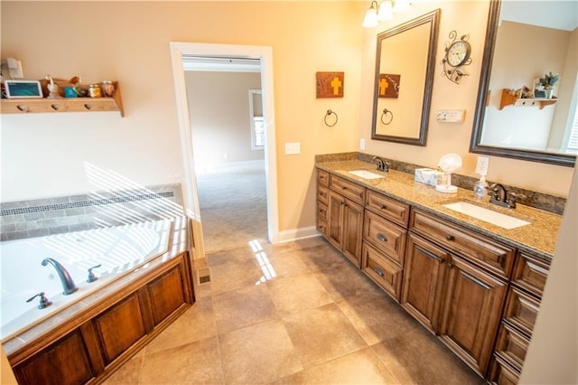 bathroom featuring double vanity and a garden tub