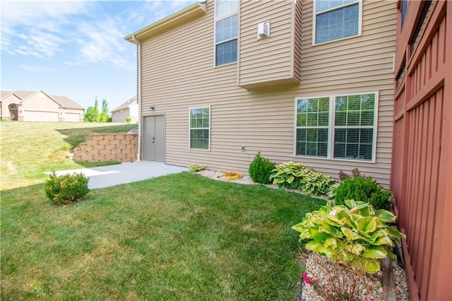 back of property with a lawn