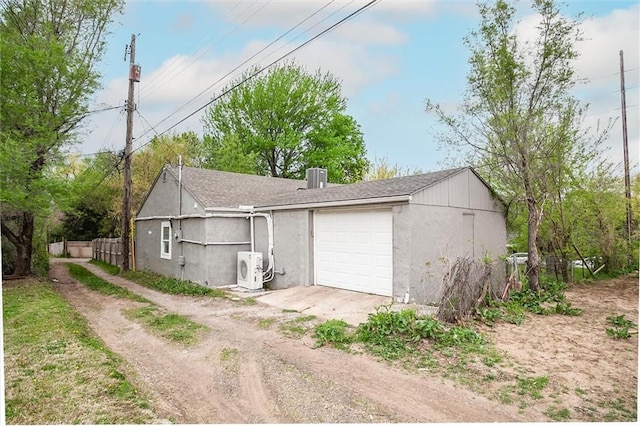 2915 Farrow Ave, Kansas City, KS 66104 - exterior space featuring driveway, ac unit, and fence