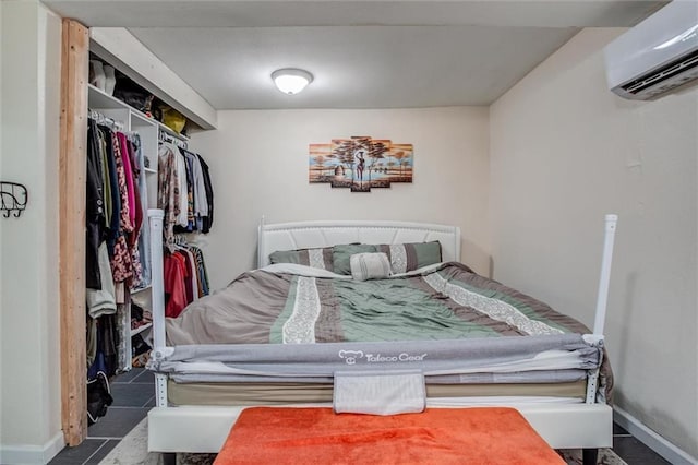 2915 Farrow Ave, Kansas City, KS 66104 - bedroom featuring baseboards and a wall mounted air conditioner