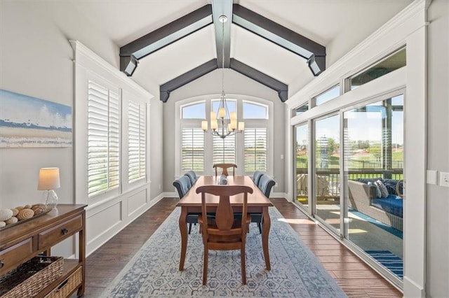 9874 Belmont Dr, Lenexa, KS 66227 - dining space featuring a chandelier and dark wood-style flooring
