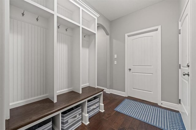 9874 Belmont Dr, Lenexa, KS 66227 - mudroom with dark wood finished floors and baseboards