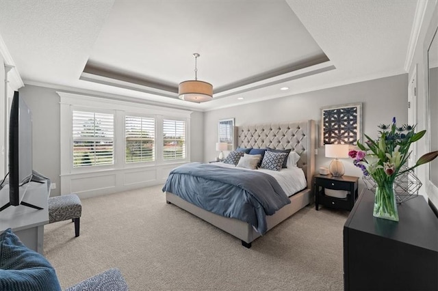 9874 Belmont Dr, Lenexa, KS 66227 - carpeted bedroom featuring a raised ceiling, ornamental molding, and recessed lighting