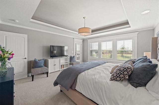9874 Belmont Dr, Lenexa, KS 66227 - carpeted bedroom featuring a tray ceiling and crown molding