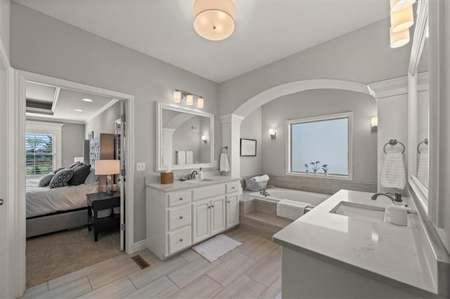 9874 Belmont Dr, Lenexa, KS 66227 - ensuite bathroom featuring vanity and a garden tub