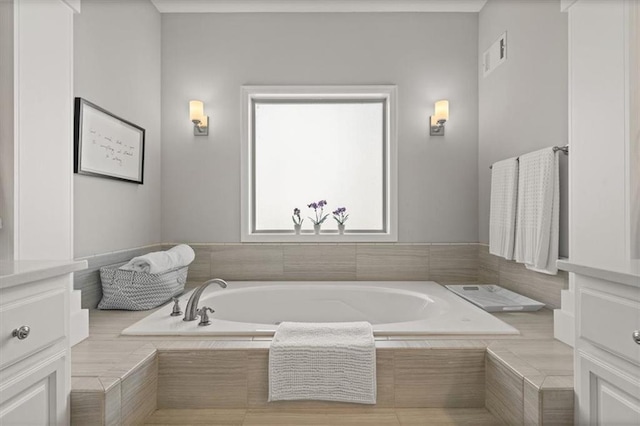 9874 Belmont Dr, Lenexa, KS 66227 - bathroom featuring a bath and vanity