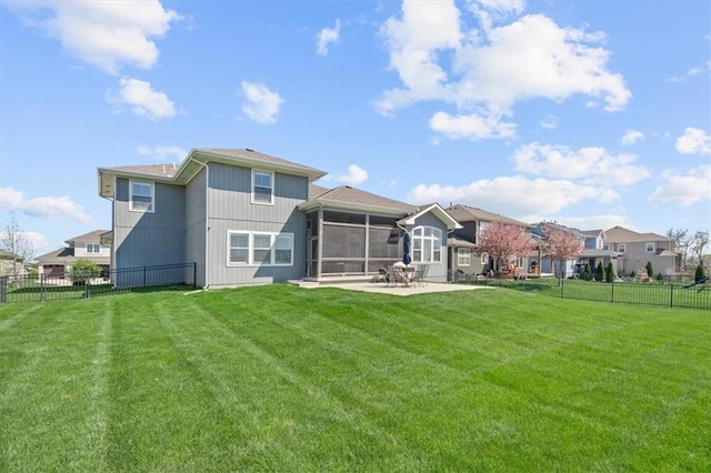 9874 Belmont Dr, Lenexa, KS 66227 - back of property with a sunroom and a patio area