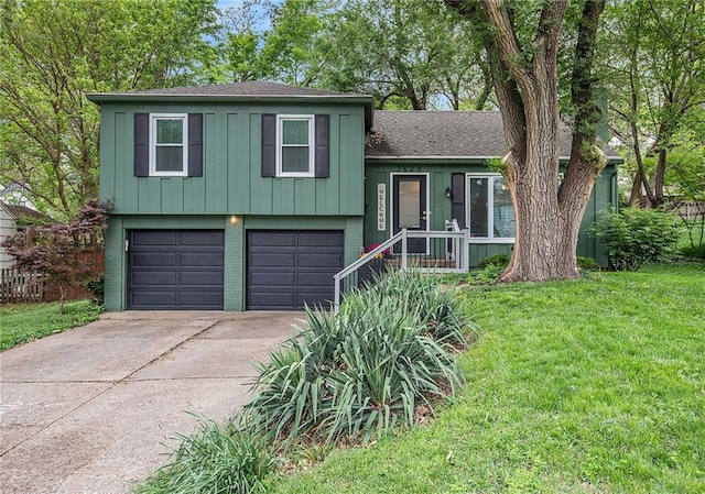 7620 Windsor St, Prairie Village, KS 66208 - tri-level home with driveway, roof with shingles, brick siding, a front lawn, and an attached garage