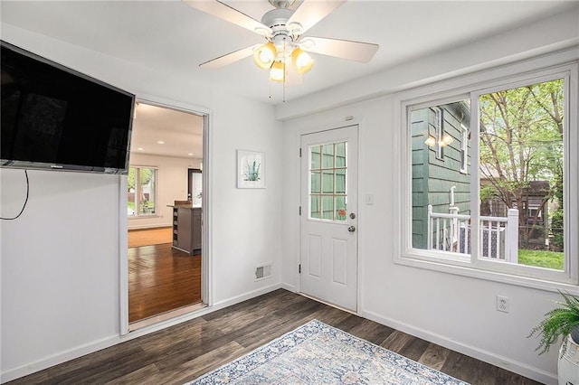 7620 Windsor St, Prairie Village, KS 66208 - entrance foyer featuring baseboards, ceiling fan, dark wood-style floors, and visible vents