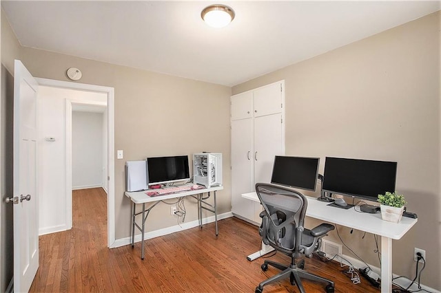 7620 Windsor St, Prairie Village, KS 66208 - home office featuring baseboards and wood finished floors