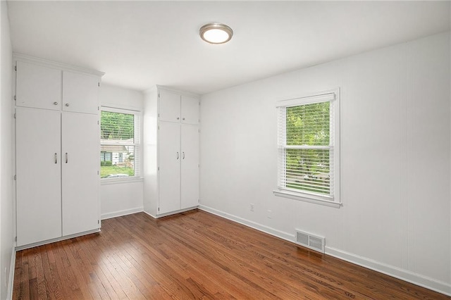 7620 Windsor St, Prairie Village, KS 66208 - interior space featuring wood-type flooring, baseboards, and visible vents