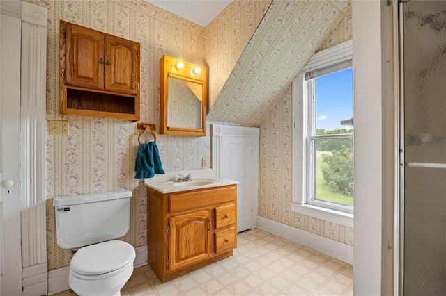 4933 SE Stubbs Rd, Tecumseh, KS 66542 - bathroom featuring wallpapered walls, vanity, and tile patterned floors