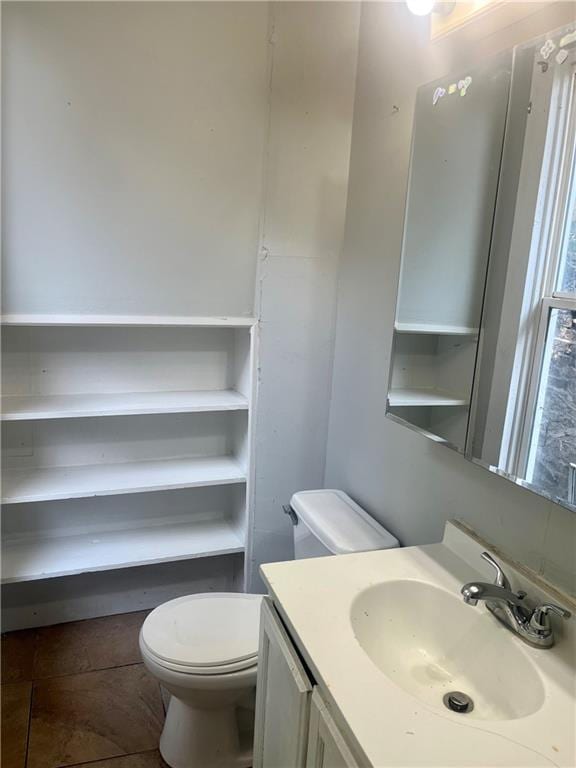 913 Vine St, Saint Joseph, MO 64503 - half bathroom with toilet and vanity
