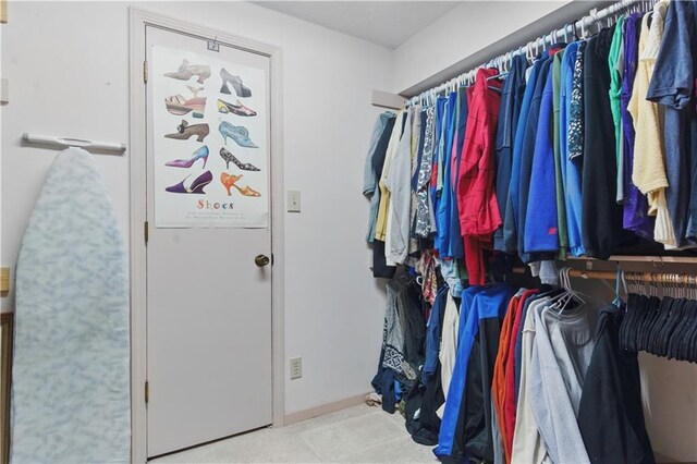 16524 Horton St, Stilwell, KS 66085 - spacious closet featuring carpet floors