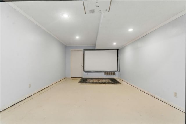 16524 Horton St, Stilwell, KS 66085 - cinema room with recessed lighting, ornamental molding, and finished concrete flooring
