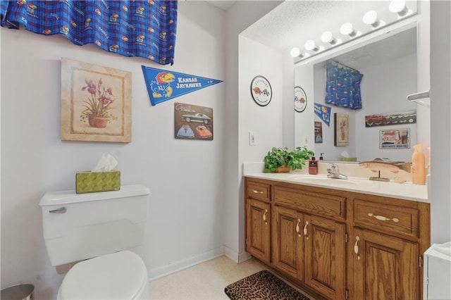 16524 Horton St, Stilwell, KS 66085 - bathroom with vanity, toilet, and baseboards