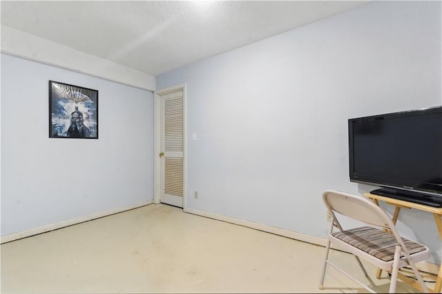 16524 Horton St, Stilwell, KS 66085 - unfurnished office with finished concrete floors and baseboards