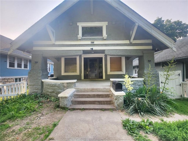 4015 Benton Blvd, Kansas City, MO 64130 - view of exterior entry with a porch and stone siding