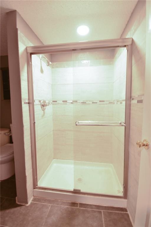 4015 Benton Blvd, Kansas City, MO 64130 - bathroom with a shower stall, tile patterned floors, and recessed lighting