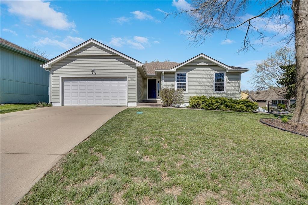 3601 NW Anchor Ct, Blue Springs, MO 64015 - ranch-style home featuring a garage, a front yard, and driveway