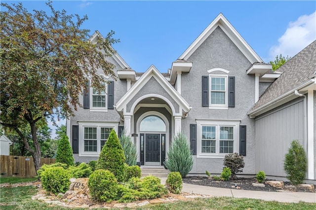 7325 Oakview St, Shawnee, KS 66216 - traditional-style house featuring stucco siding