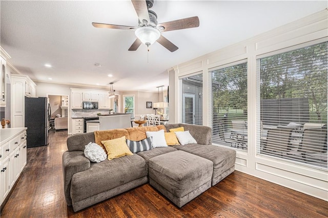 7325 Oakview St, Shawnee, KS 66216 - living room with ornamental molding, a ceiling fan, dark wood-style floors, and recessed lighting