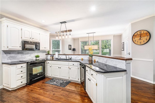 7325 Oakview St, Shawnee, KS 66216 - kitchen featuring black appliances, a peninsula, ornamental molding, decorative backsplash, and white cabinetry