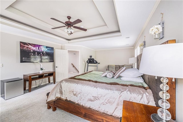 7325 Oakview St, Shawnee, KS 66216 - carpeted bedroom with a raised ceiling, crown molding, refrigerator, and ceiling fan