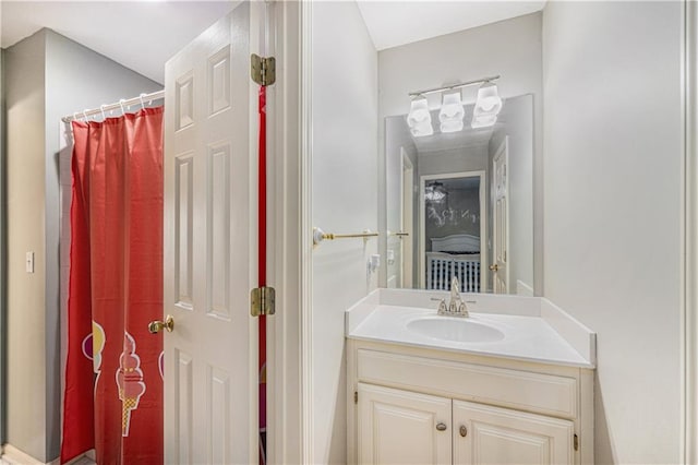 7325 Oakview St, Shawnee, KS 66216 - bathroom featuring vanity and curtained shower