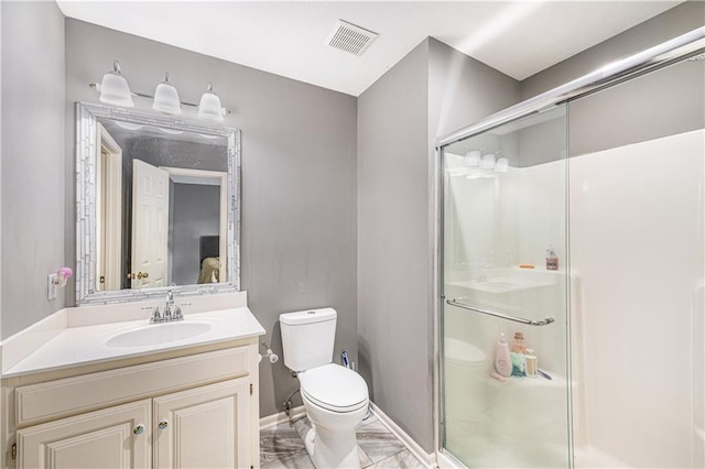 7325 Oakview St, Shawnee, KS 66216 - bathroom with marble look tile flooring, a shower stall, and vanity