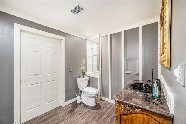 7325 Oakview St, Shawnee, KS 66216 - bathroom with wood finished floors and vanity