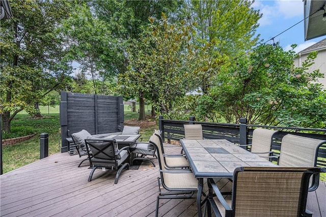 7325 Oakview St, Shawnee, KS 66216 - wooden deck featuring outdoor dining space