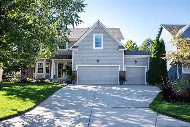 view of front facade with concrete driveway, a front lawn, a garage, brick siding, and roof with shingles