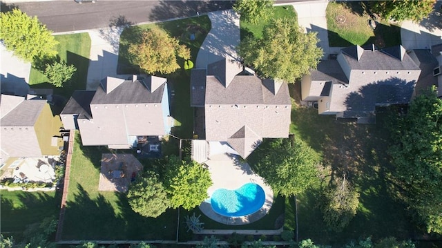 aerial perspective of suburban area with a pool