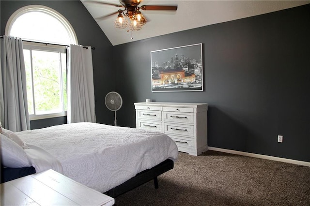 bedroom with carpet floors, a ceiling fan, baseboards, and vaulted ceiling