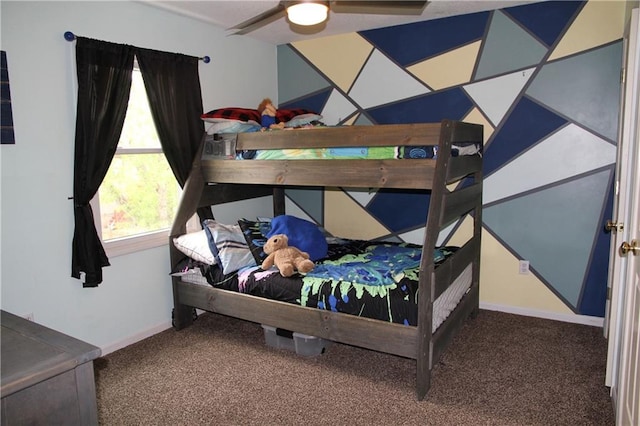 bedroom with baseboards and carpet