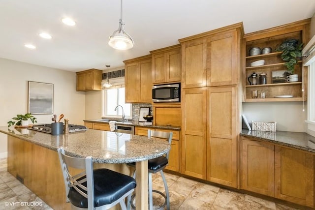 5825 Rockhill Rd, Kansas City, MO 64110 - kitchen featuring stainless steel appliances, a sink, brown cabinetry, light stone countertops, and open shelves
