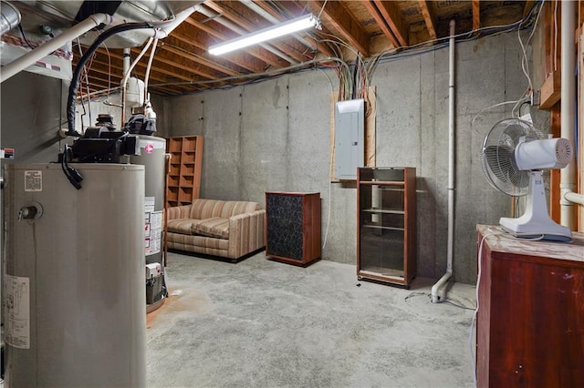 unfinished basement featuring water heater and electric panel
